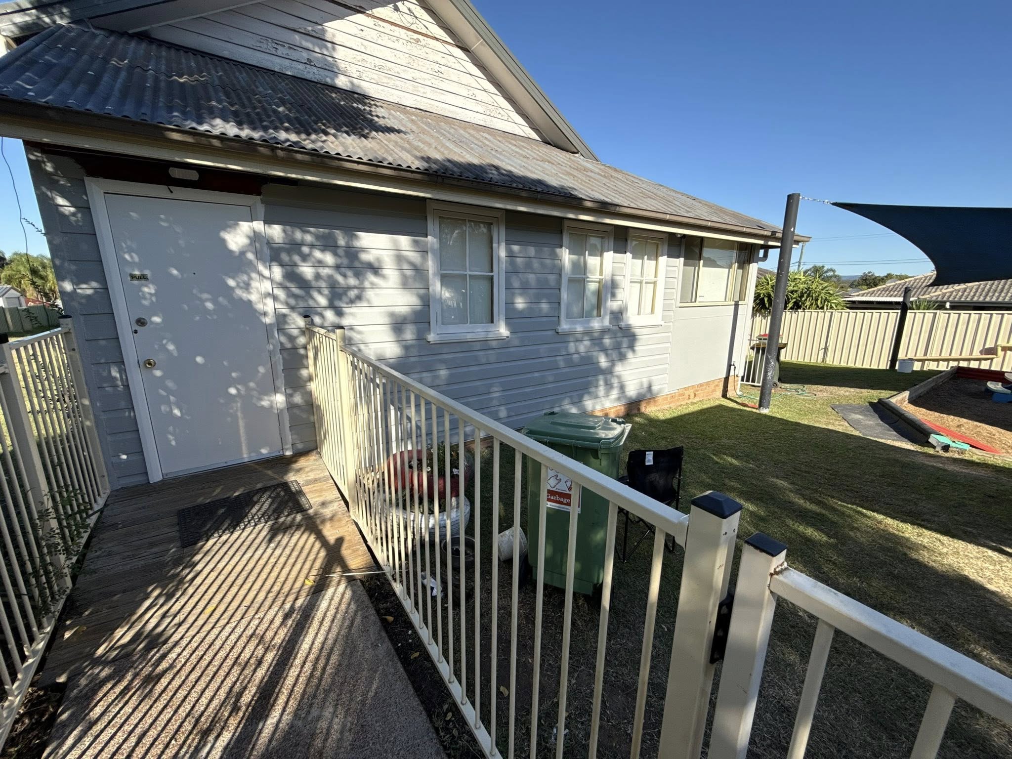 Painted metal and Colorbond roof on a Newcastle home by Hughesys Painting