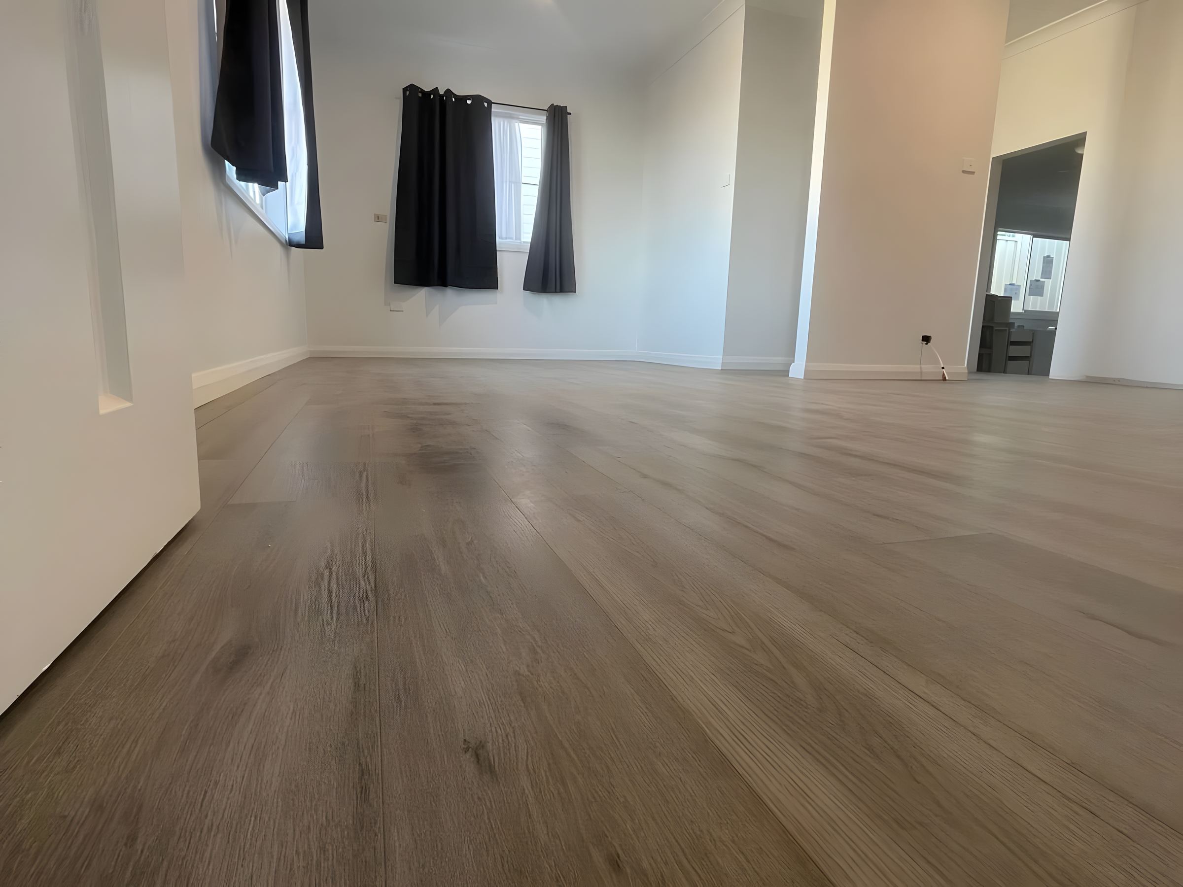 Living room with a new floor after painting