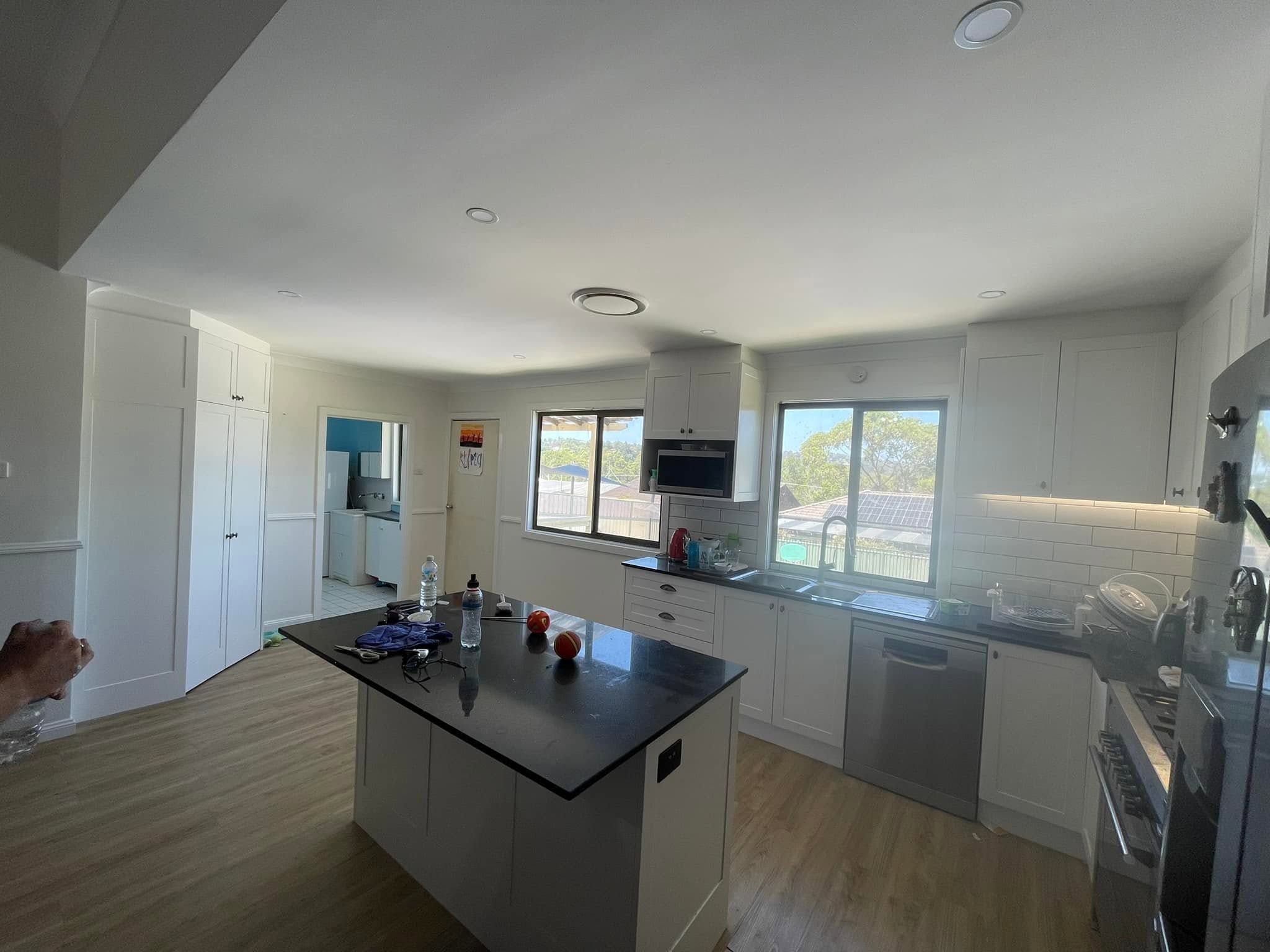 White kitchen island after painting