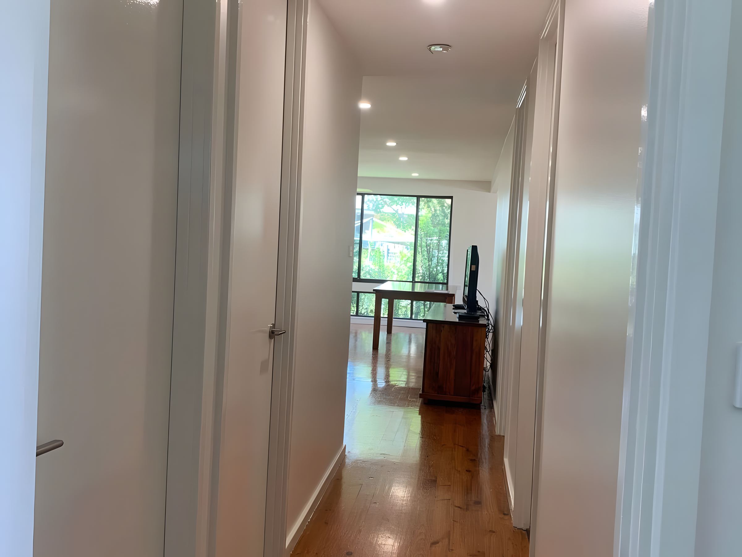 Hallway with timber floors after painting