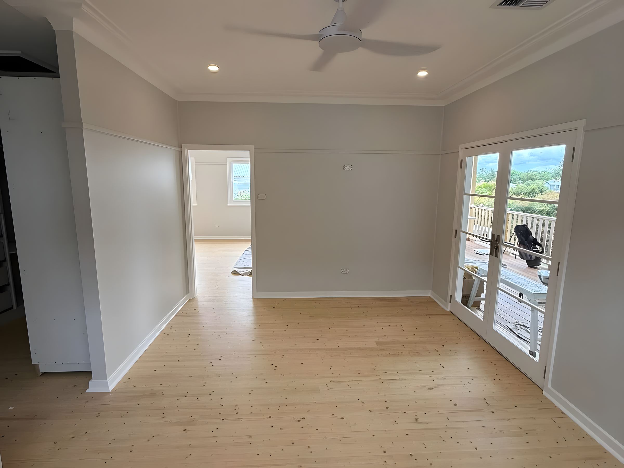 Living room with timber floors after painting