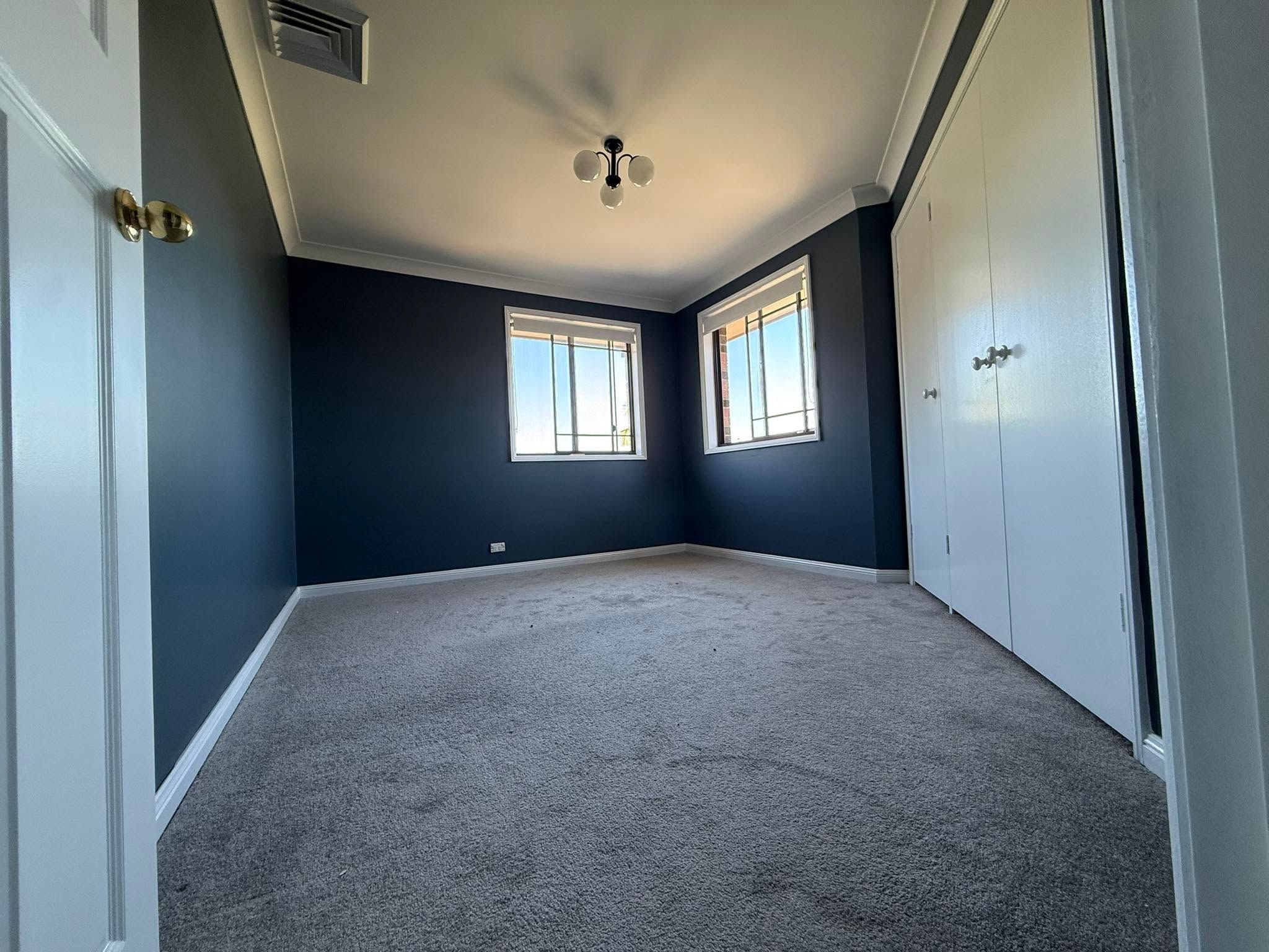 Navy painted bedroom