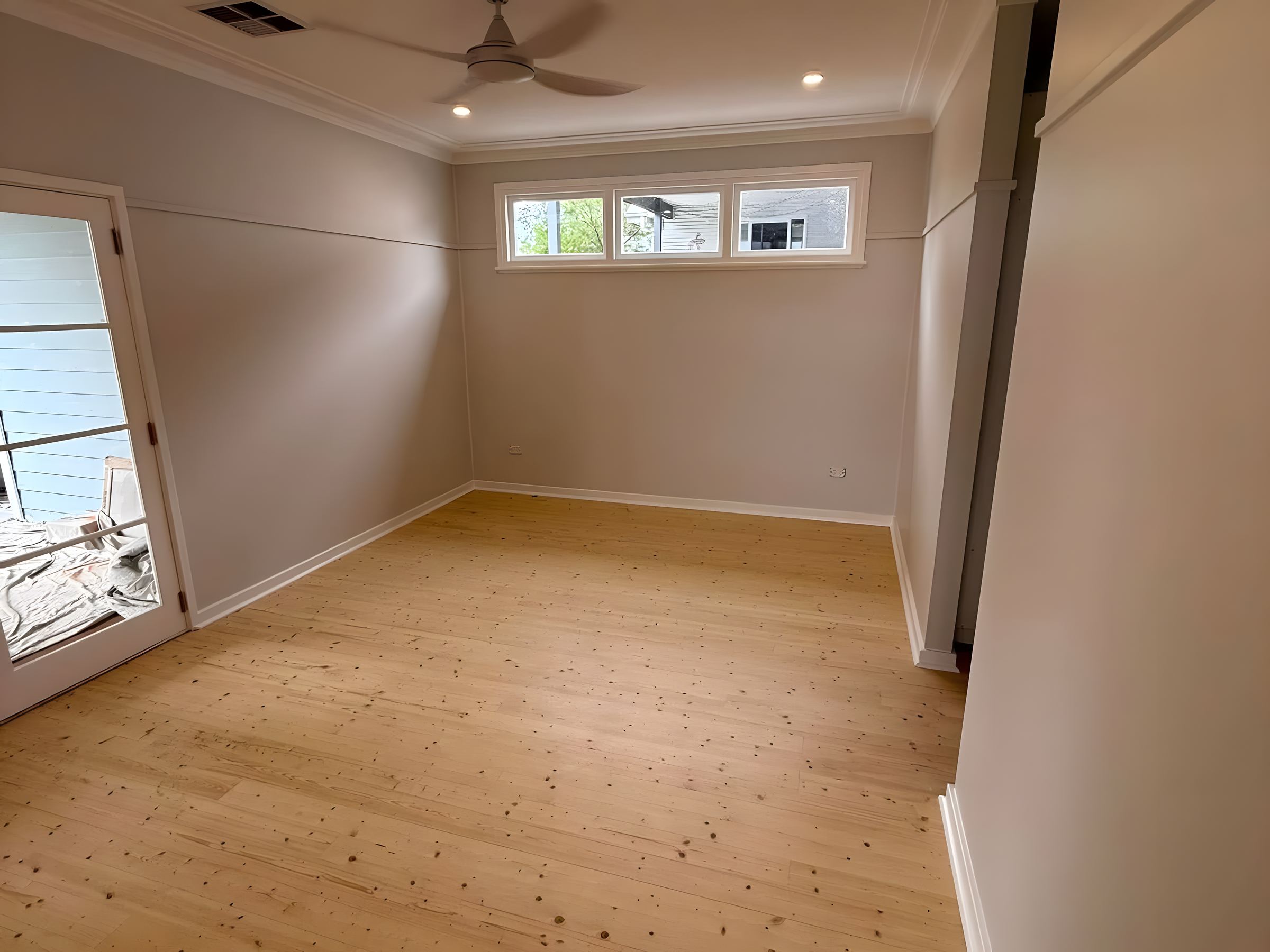 Bedroom with timber floors after painting