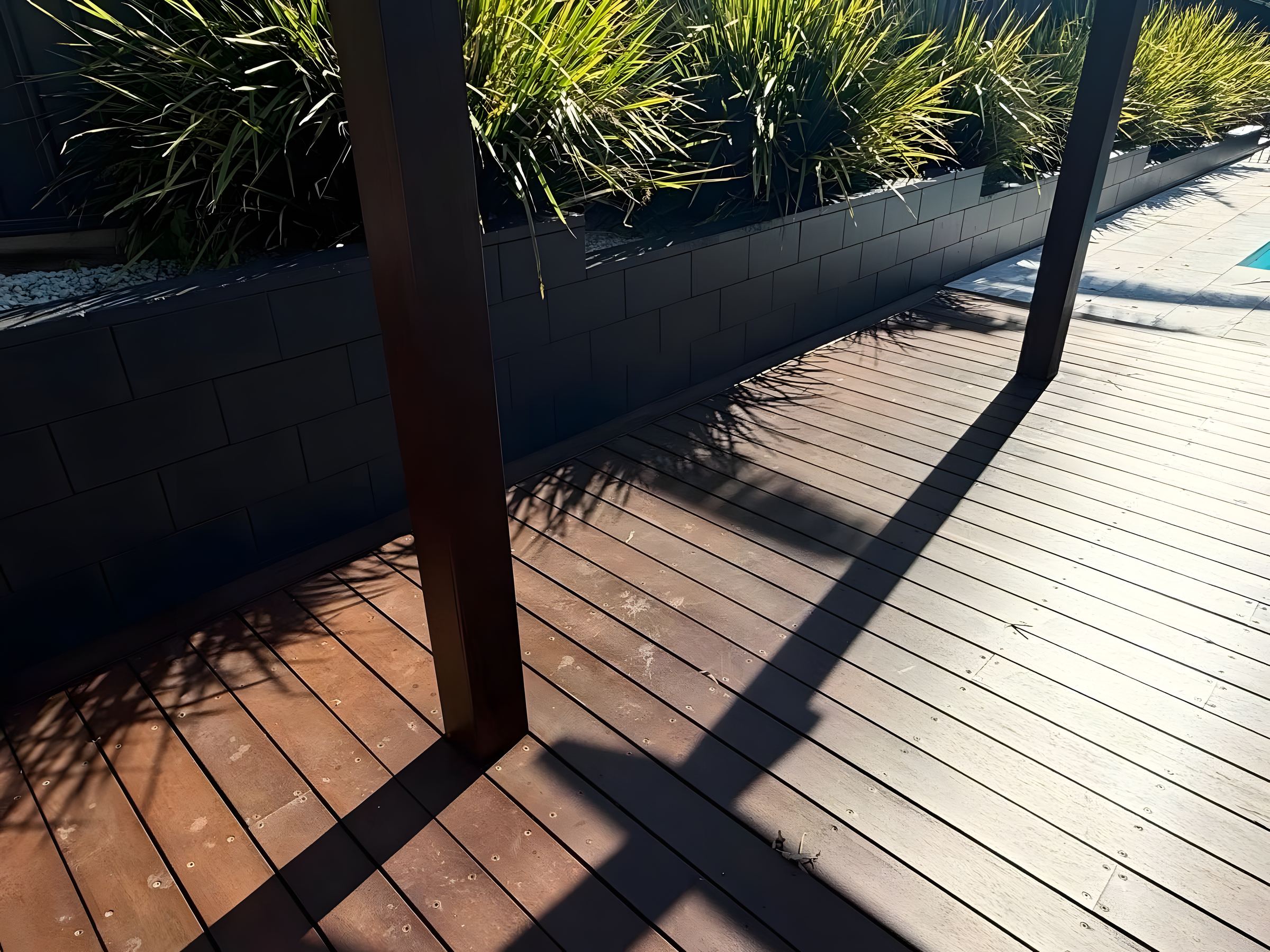 Deck after staining, in afternoon light