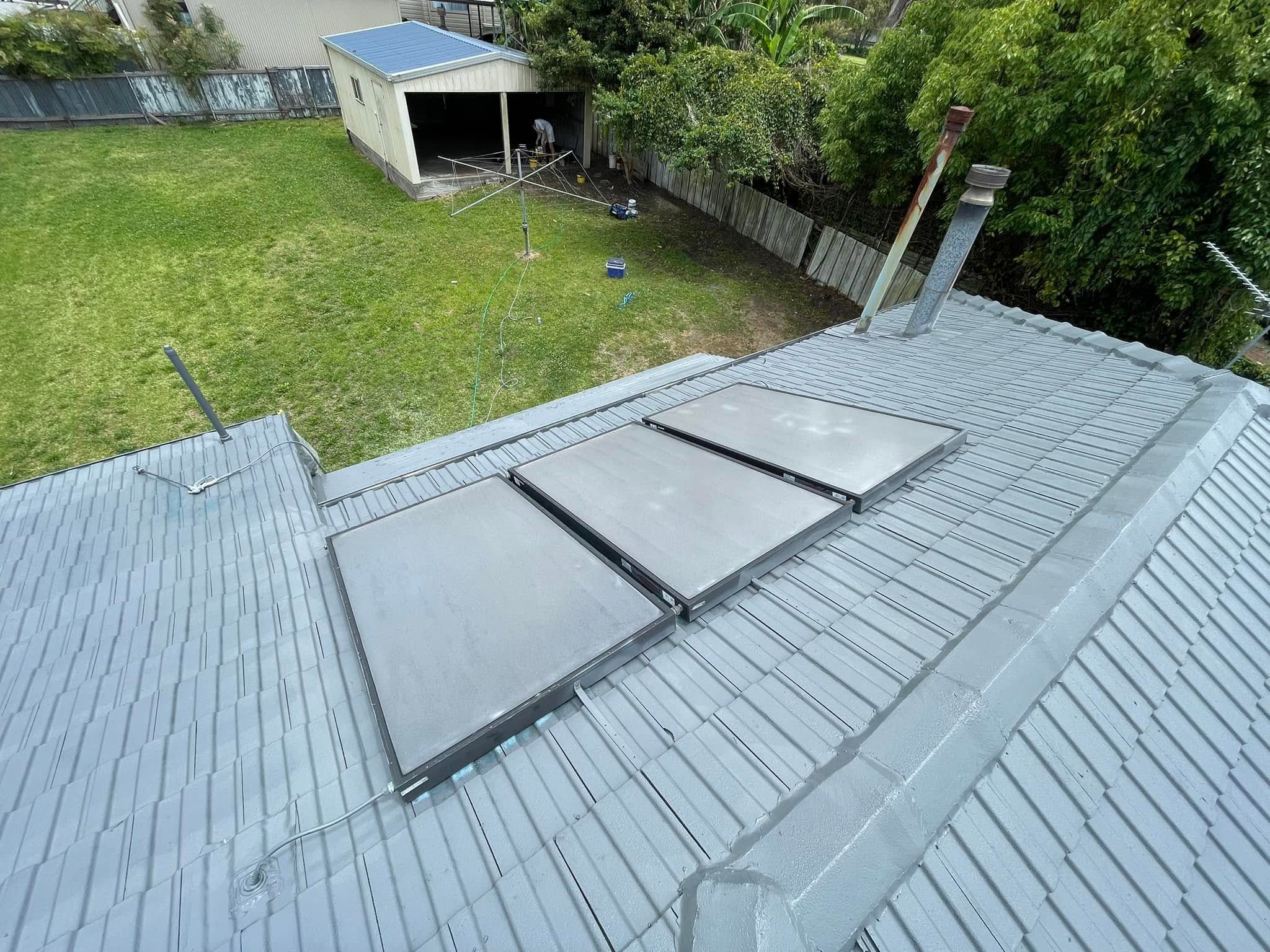 Restored tile roof with solar panels