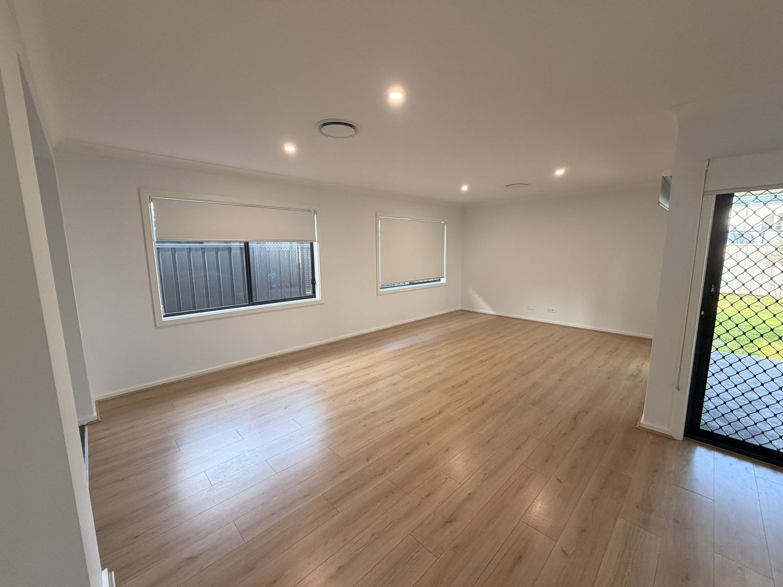 Bright freshly painted living room interior by Hughesys Painting Newcastle